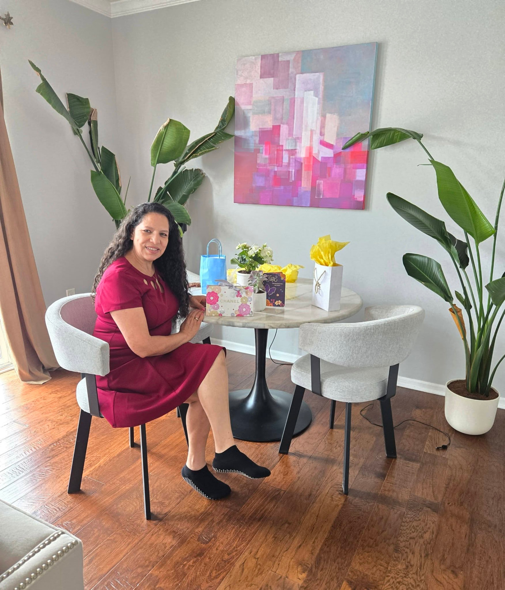 Portrait of Alicia, founder of Hello Limpia, in a sunlit home